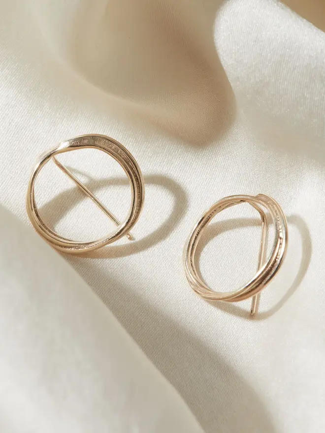 Solid 9ct Gold Organic Circle Threader Earrings on a silk material