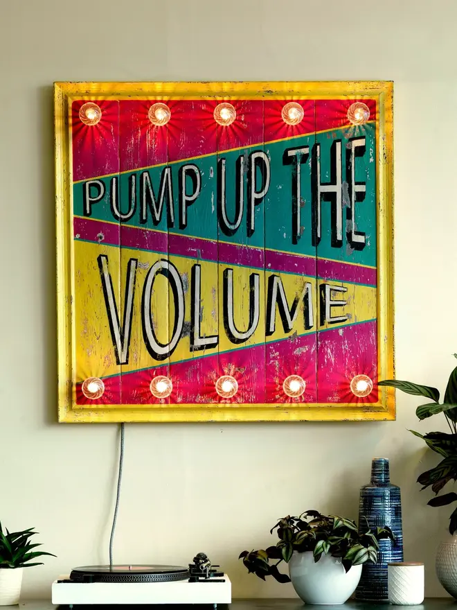 pump up the volume circus style sign