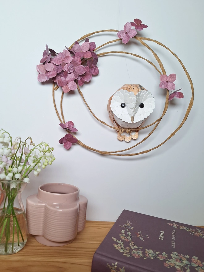 Barn owl baby wall art sculpture, perched on a floral wreath