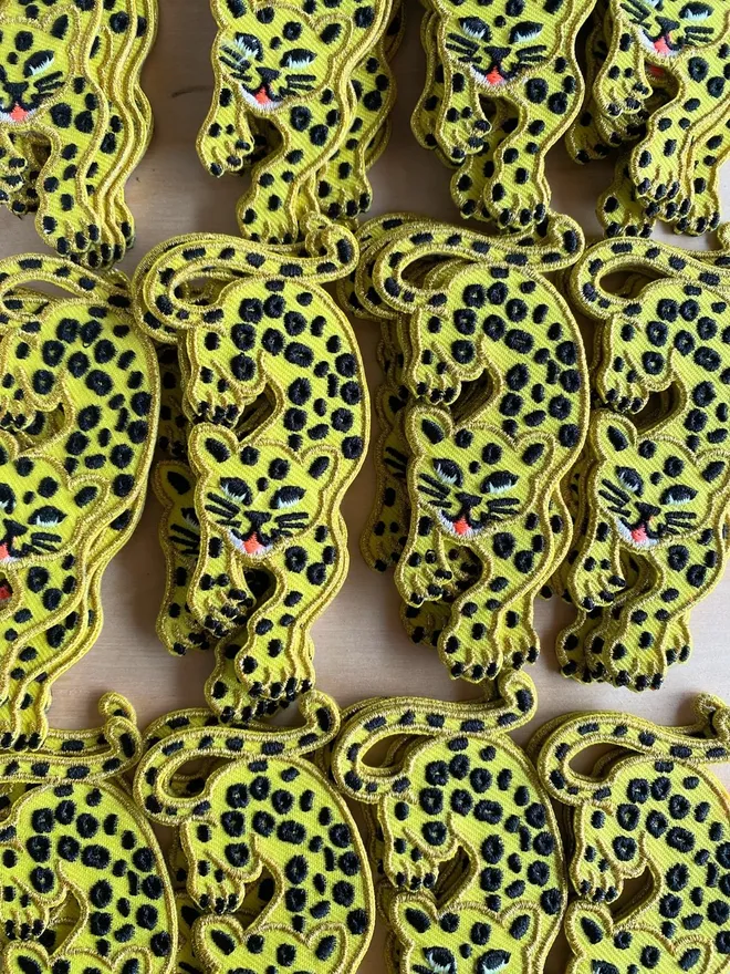 Embroidered yellow leopard iron on patches.