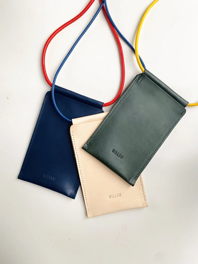 Leather phone bag with colourful strap