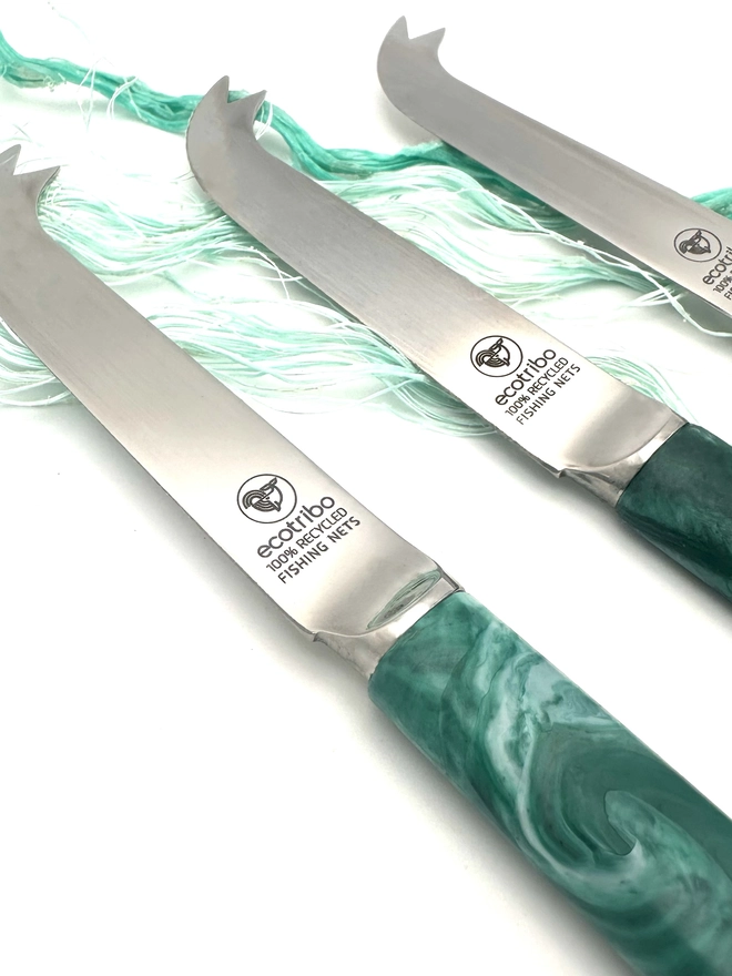 Sustainable cheese knife made from recycled ocean plastic with a unique marbled finish, handcrafted in Britain.