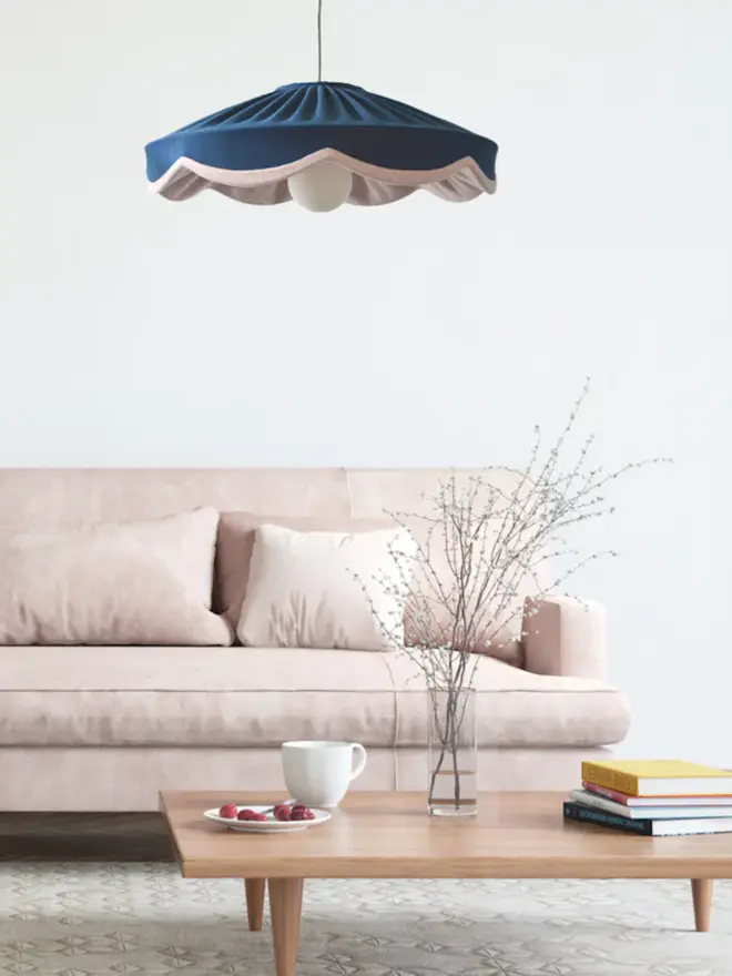Navy & Pink Linen Scallop Lampshade hanging over couch and coffee table