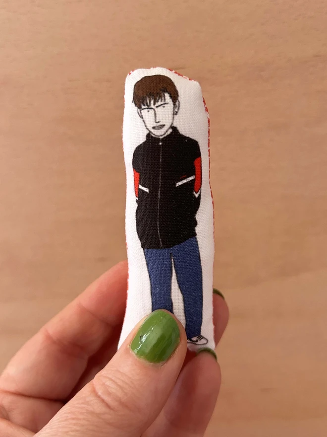 Mini fabric doll featuring illustration of Blur frontman, Damon Albarn.