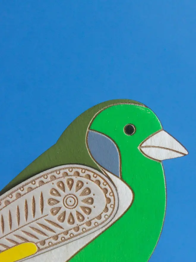 Standing Wooden Greenfinch, green wooden bird standing on a platform. 
