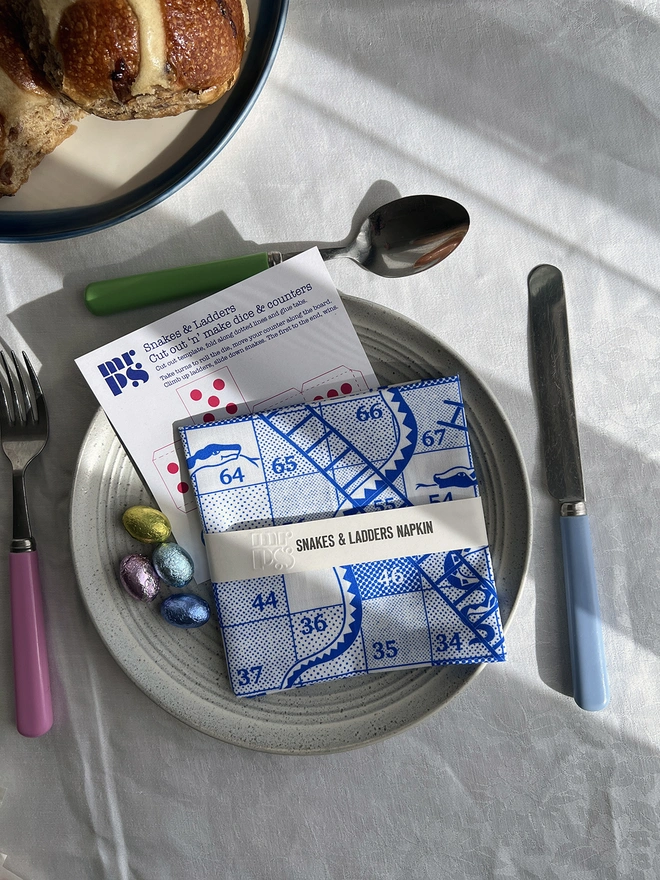 Snakes and Ladders napkin on an easter table