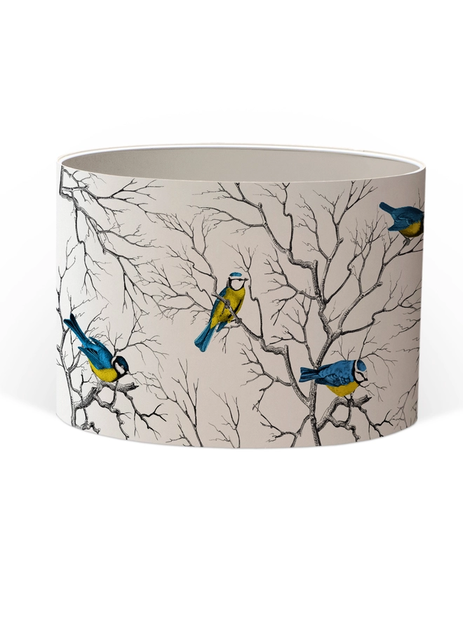 Blue Tit lampshade featuring a playful pattern of colourful British garden birds.