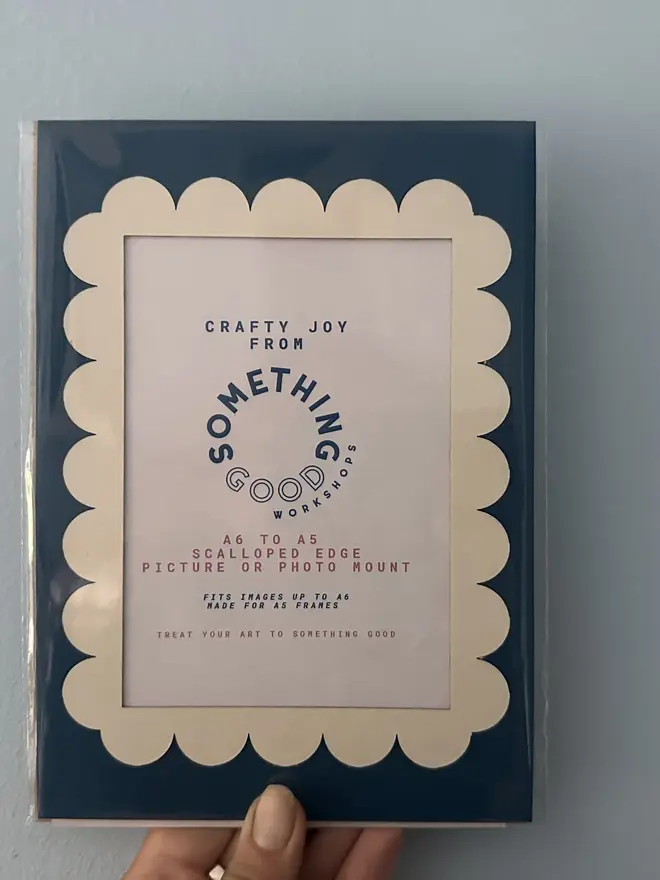 Scallop Edged A5 / A4 photo mount. blue and white mount photographed against grey background.