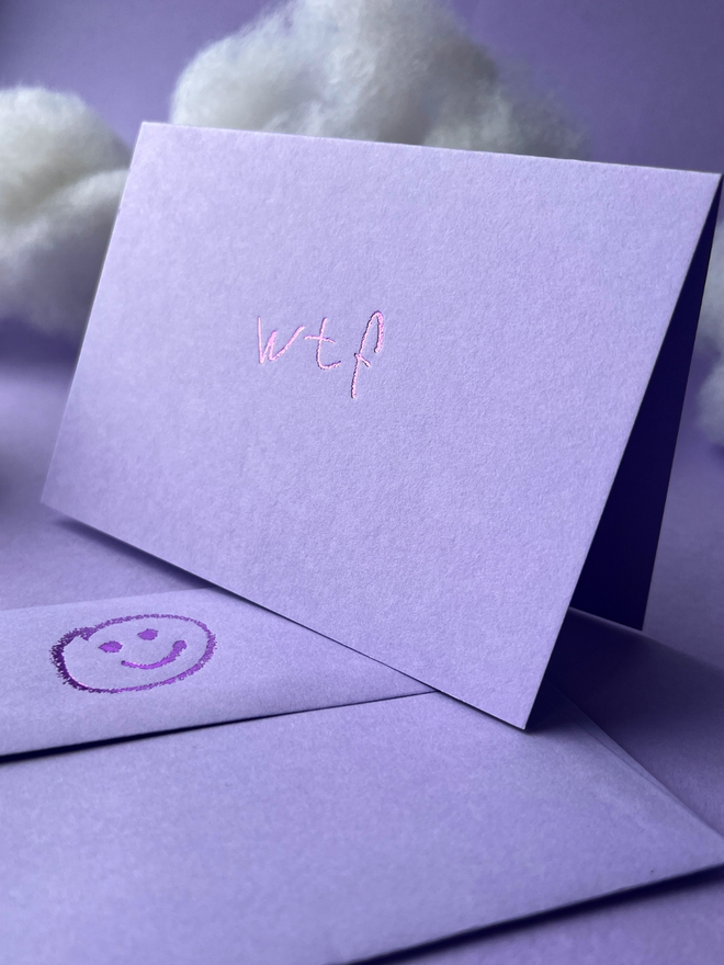 lavender coloured card with wtf short for 'what the fuck' hand foiled in kids hand writing