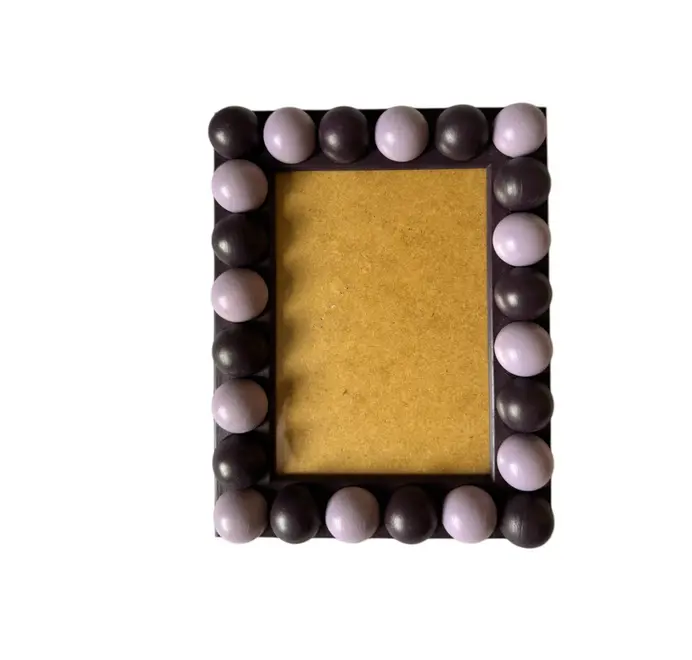 purple and lavender wood bobbin frame