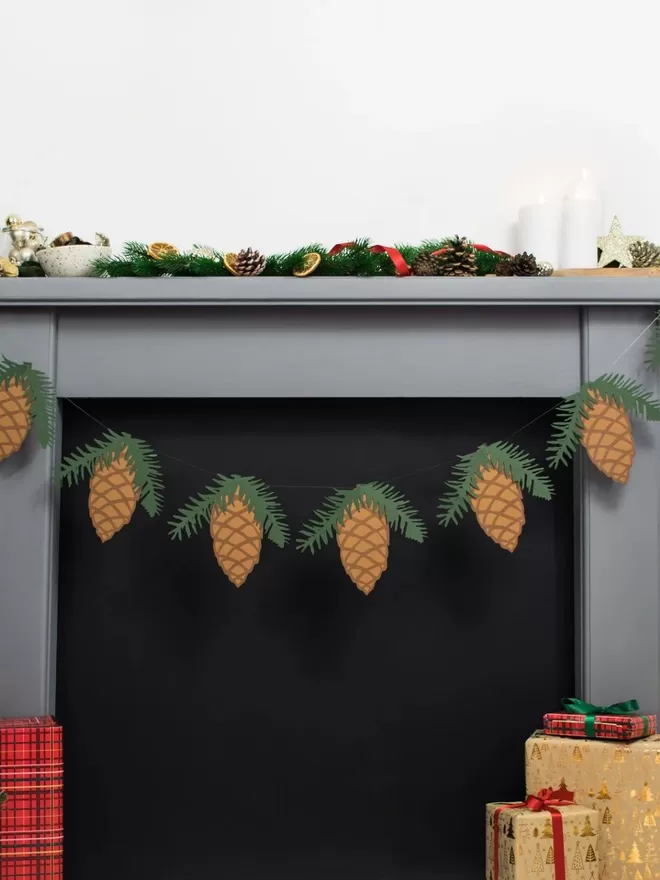 Pinecone Christmas Bunting strung across mantelpiece
