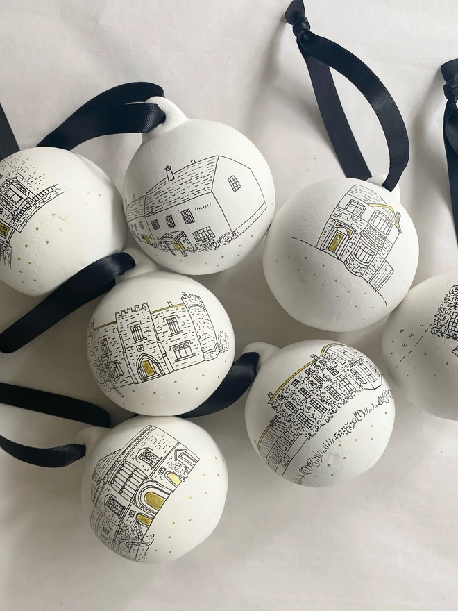 A collection of baubles featuring different venue illustrations