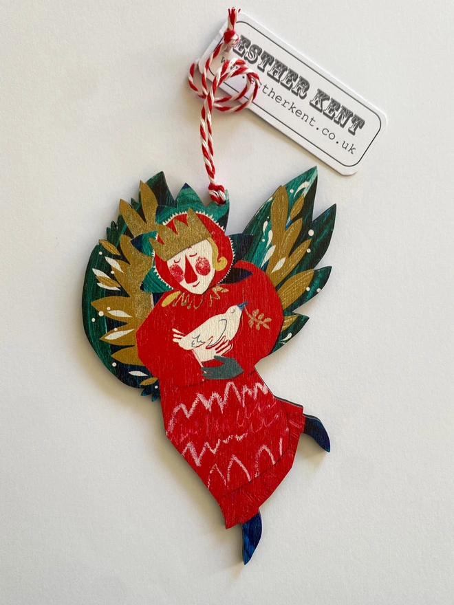Red and green illustrated angel decoration by Esther Kent