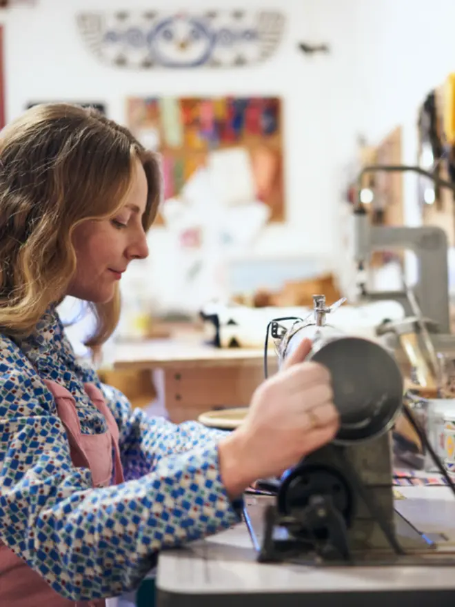 Our Handmade dog collars being sewn