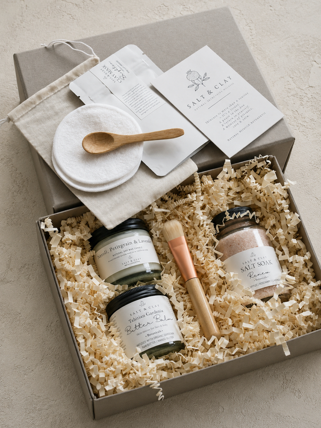 a gift set of pampering bath and body products in a home spa gift set from salt & clay