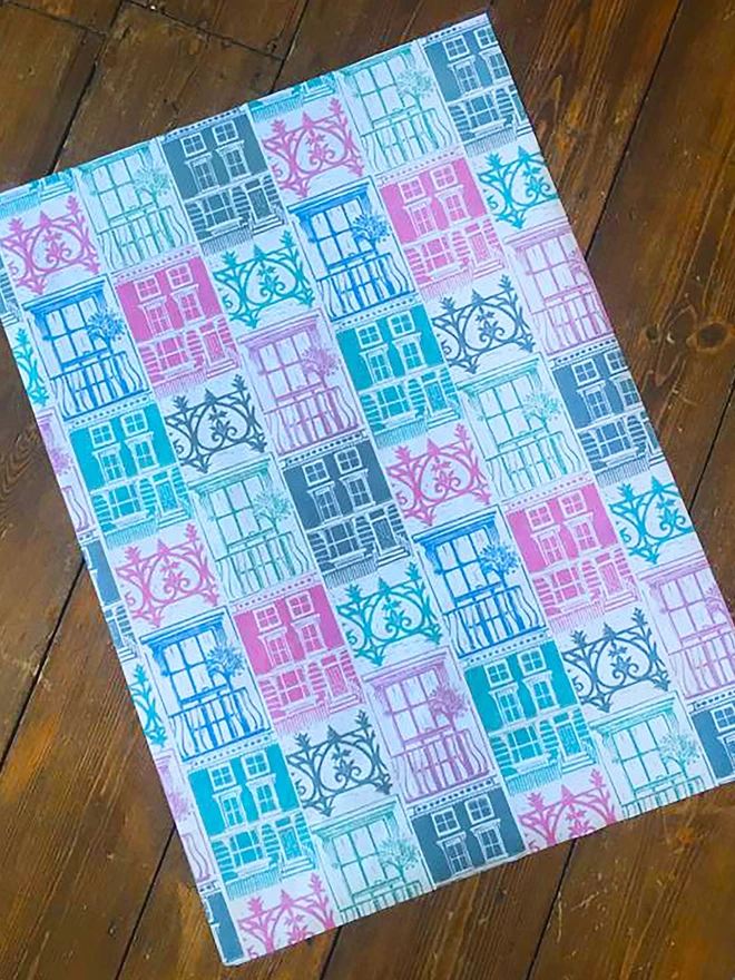 Pastel shades London houses wrapping paper lino cut by Kate Guy