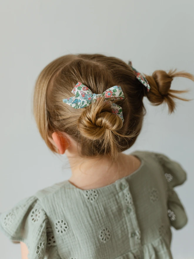 girl wearing her liberty hair bows
