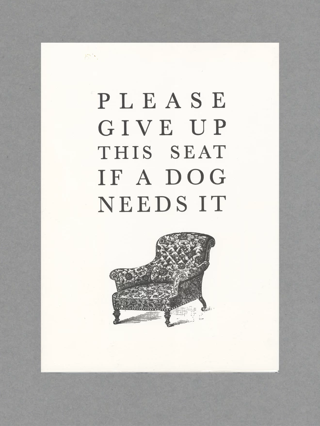  An A3 print with text reading 'Please give up this seat if a dog needs it' and an illustration of an armchair.