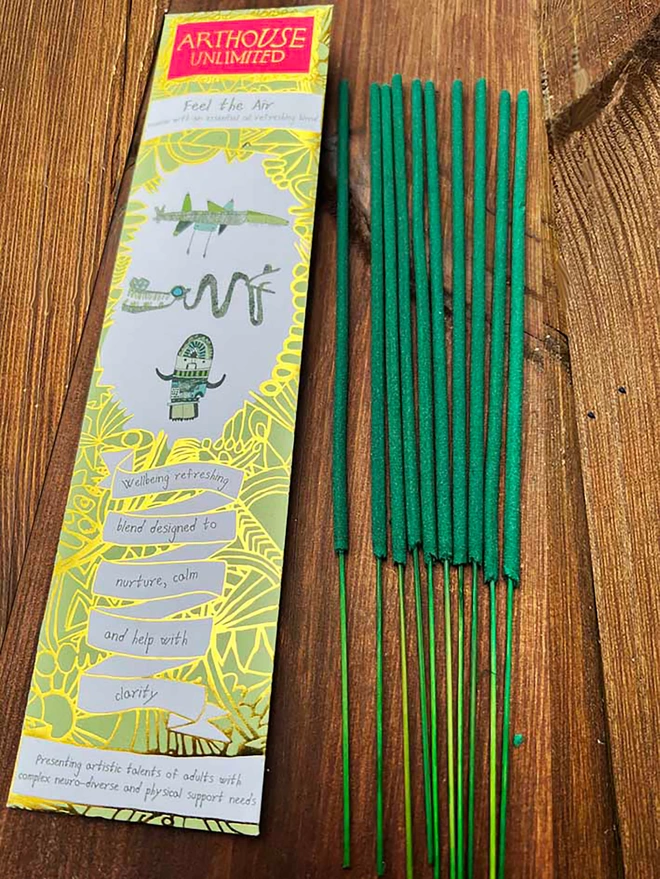 pack of 10 feel the air well being charity incense sticks with gold & green illustrations
