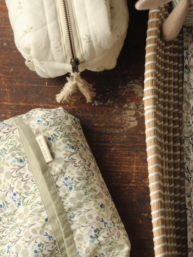 A riverbank baby wipes cover together with a wash bag