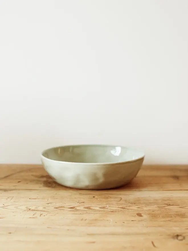 'seaglass' handcrafted stoneware bowls. a medium green stoneware serving bowl.