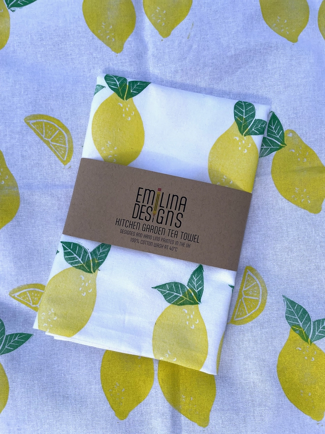 Bright yellow zesty lemon pattern with lemon slices and leaves as well