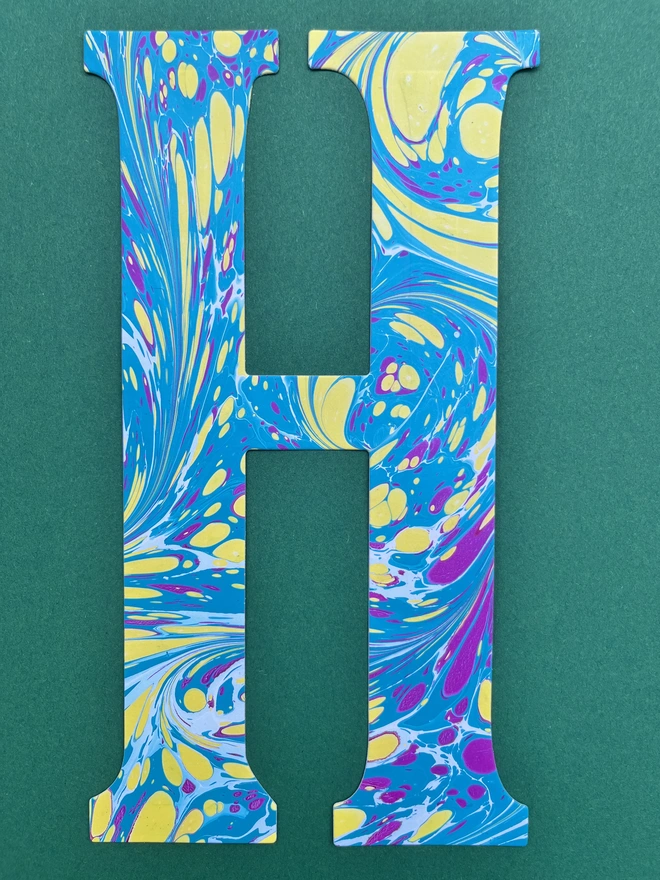 Hand-marbled happy birthday garland letter