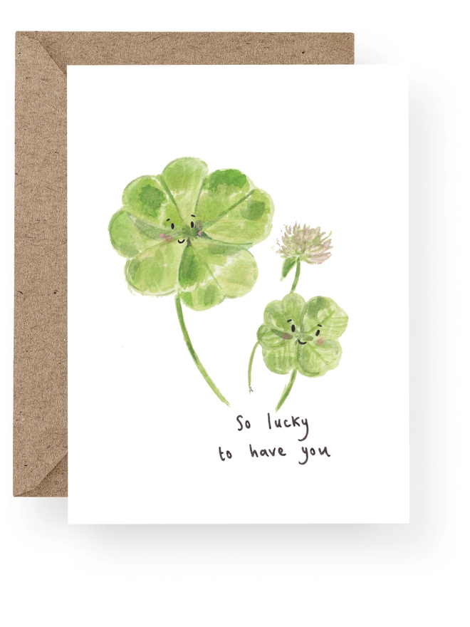 Lucky to have you, Four Leaf Clover Greeting Card featuring a watercolour illustration of a large and small four leaf clover the card reads 'So lucky to have you'