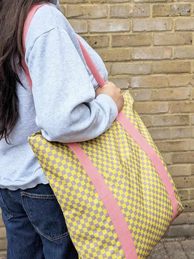 Tote Cotton Shopper Bag, a woman holding a colourful patterned tote bag over her shoulder. 
