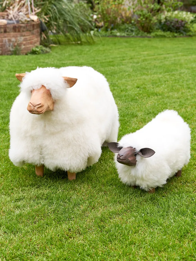 'Mirabeaux' sheep & 'Edith' sheep footstool placed in the garden for spring
