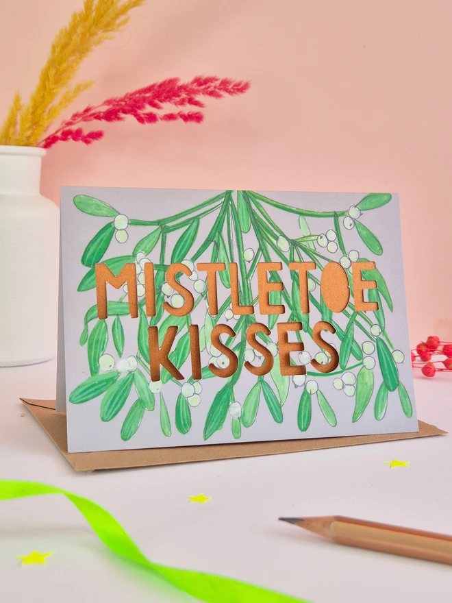 Mistletoe illustration christmas card with shimmering rose gold pearlescent liner 