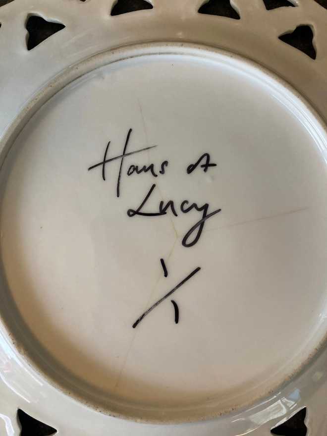 Haus of Lucy signature on back of plate