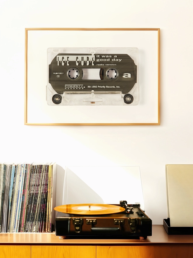 ice cube it was a good day cassette tape print. framed print hung up above record player and vinyl collection.
