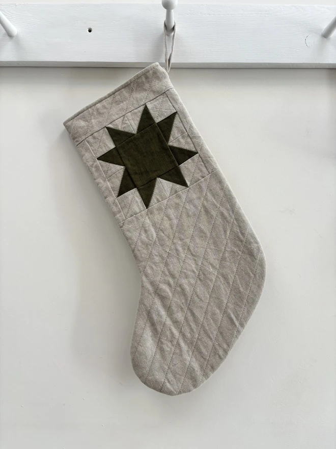 Medium Quilted Linen Star Christmas Stocking in Natural Linen with Green Linen Patchwork Star Design.