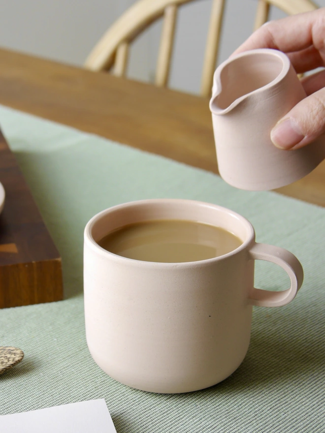 Ceramic Milk Jug being used