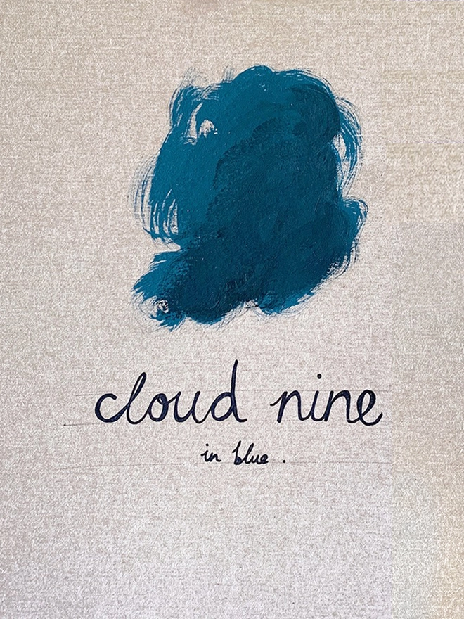 painting of blue cloud and cloud nine text in frame