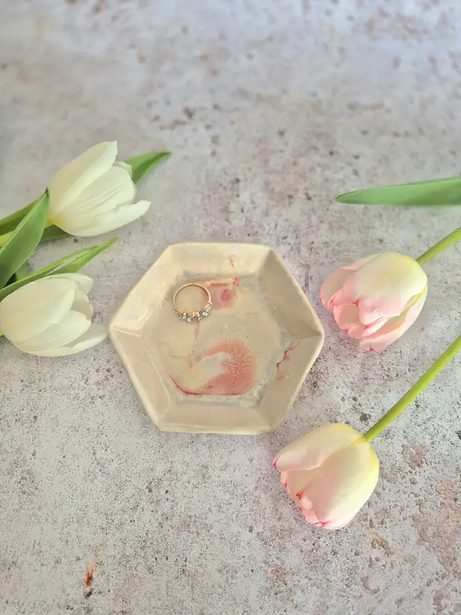 Mini Hexagon Trinket Jewellery Ring dish, ceramic dish, pottery dish, gift, homeware, Jenny Hopps Pottery Photographed on a mottled white backdrop with dried flowers and earrings, cream, white and pink