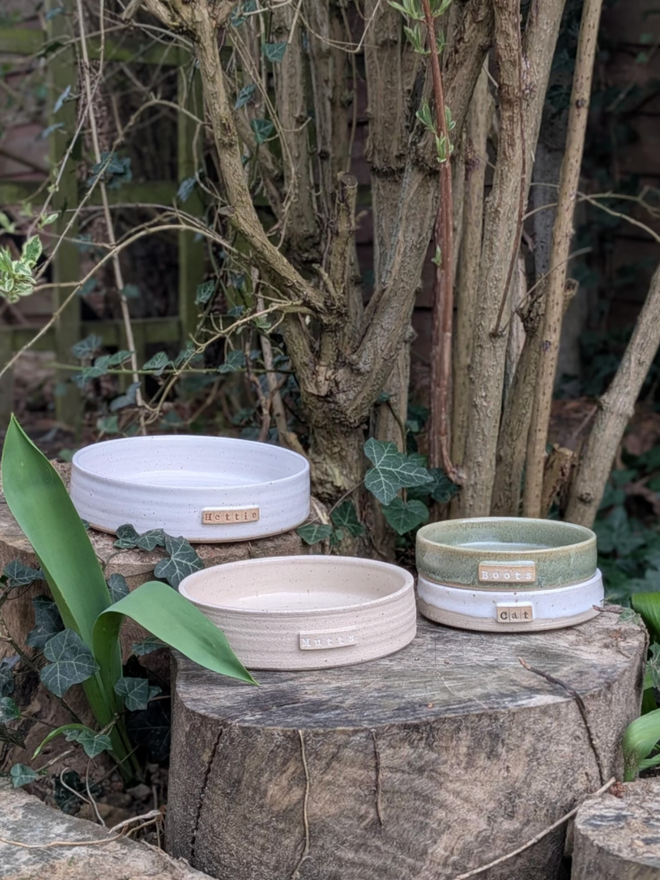 Stoneware Pet Bowl. A selection of pet bowls showing all available colours. (Left-Right Large, Medium, 2 Small)