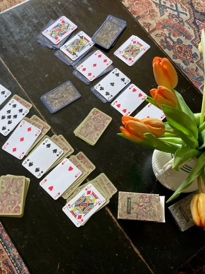 Playing Cards. A spread of cards with both colours available shown.