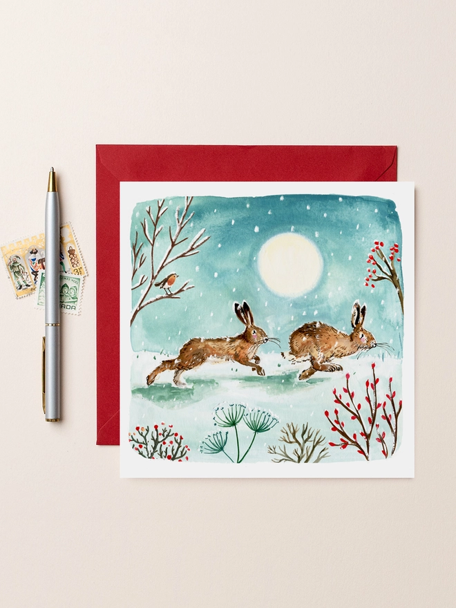 Two Hares Running Blank Christmas Card
