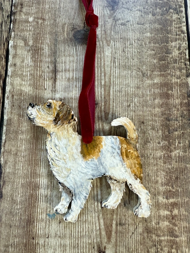 Wire Haired Jack Russell Dog Christmas decoration strung with red velvet ribbon