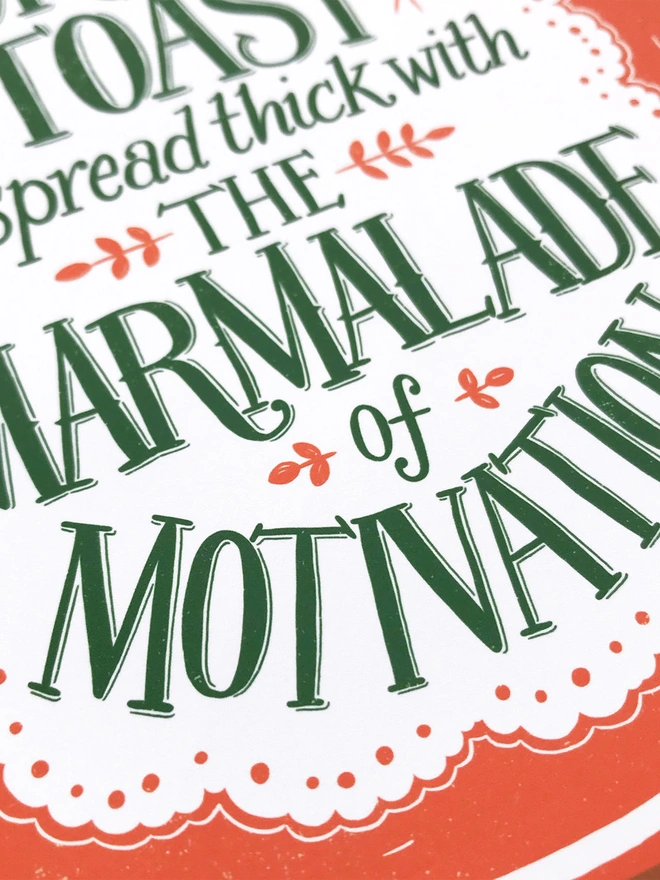 green marmalade hand lettering on an orange background