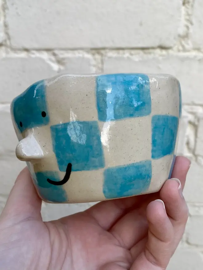 blue white check handmade ceramic smiley face pot