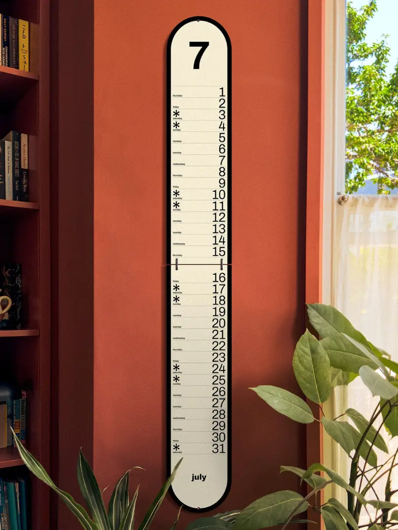 Obok 2027 Arched Wall Calendar, on the wall. 