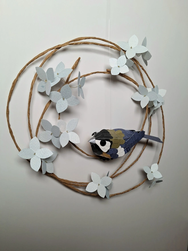 great tit on a floral wreath