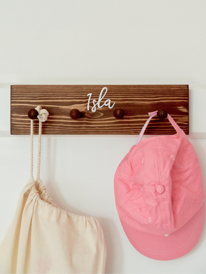 Personalised wooden peg rail