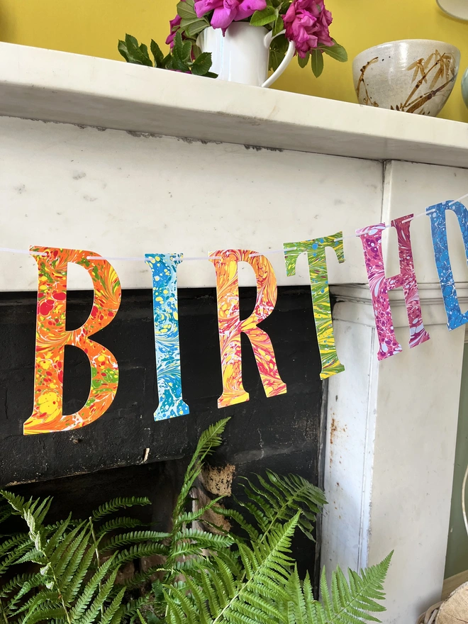 Hand-marbled happy birthday garland