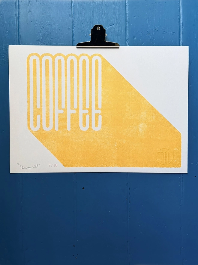 'Coffee' Gold Screen Print, on a blue background. 