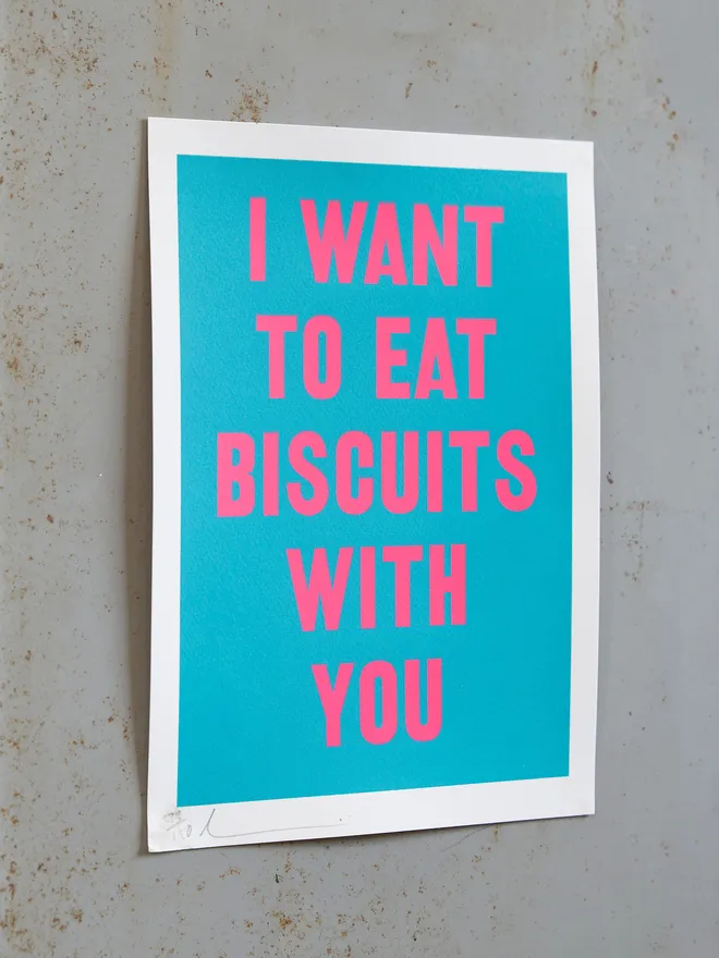 'I Want to Eat Biscuits with You' screen print in bright blue with neon pink text, on a grey locker type background