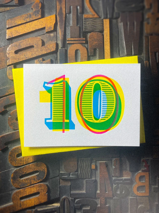 10th birthday anniversary typographic letterpress card. Deep impression print. Unique with no print being the same. They show slight colour variations adding to the style. Also available in other milestones : 1, 2, 3, 18, 21, 30, 40, 50, 60, 70, 80.